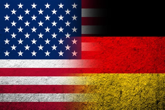 The national flag of Germany with United States of America USA national flag. Grunge background