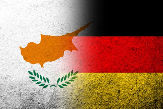 The national flag of Germany with the Republic of Cyprus National flag. Grunge background