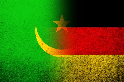 The national flag of Germany with the Islamic Republic of Mauritania National flag. Grunge background