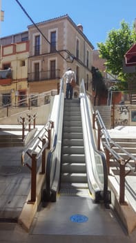 Caceres, Spain - May 21st, 2021: Alzapiernas scalator at Caceres downtown, Extremadura, Spain