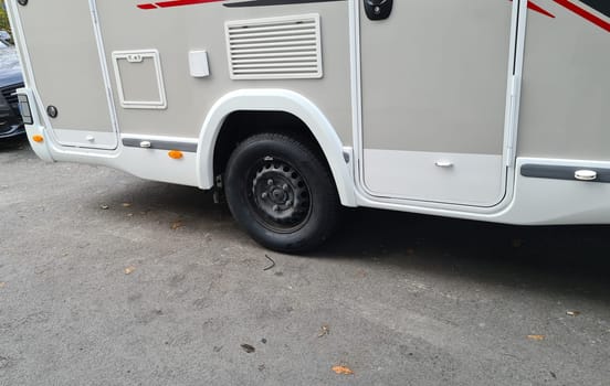 Motorhomes or campervans changing tires in the workshop from winter to summer or all-season tires