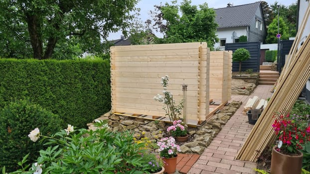 Garden shed built from tree trunks