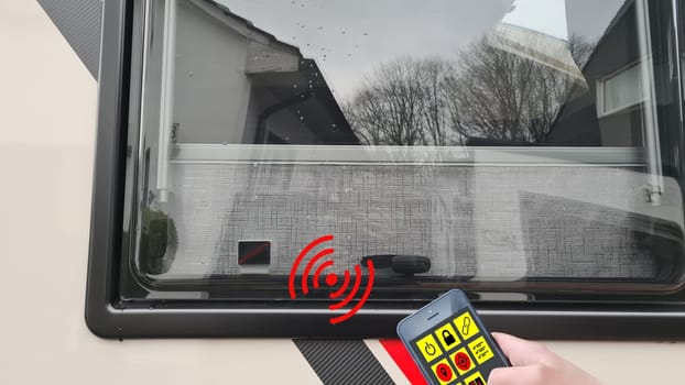 Contact of an alarm system on the window of a caravan motorhome