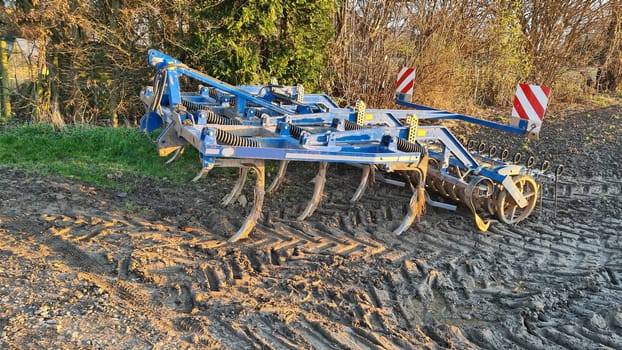 Use harrow with multiple metal teeth to pulverize the soil