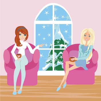 women talking over a cup of coffee