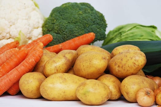 Fresh organic vegetables on white background