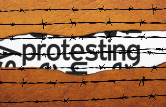 Protest concept on barbwire