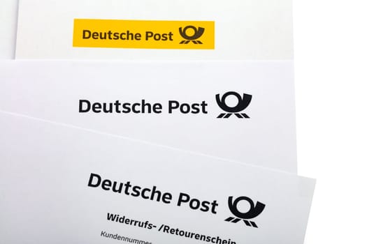 HUETTENBERG, GERMANY 2022-03-15 - Deutsche Post German Post (Deutsche Post DHL) on white envelope. Deutsche Post DHL, is the world's largest courier company.