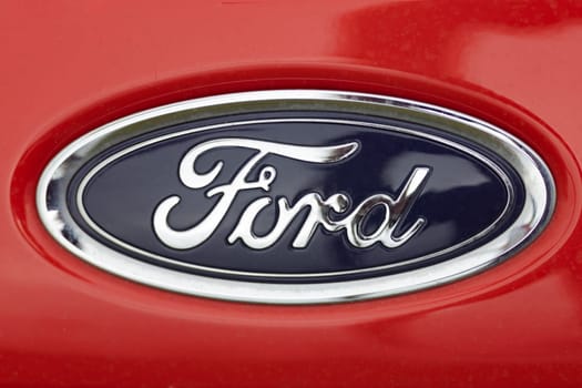 WETZLAR, GERMANY 2022-04-23: Ford logo on front of a car. Ford is an American multinational automaker that has its main headquarters in Detroit.
