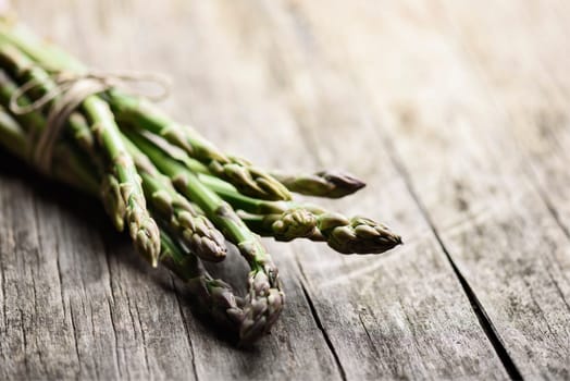 Asparagus on rustic wooden table