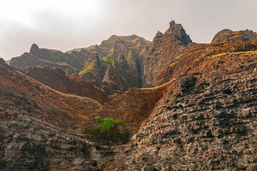 Steep Volcanic Cliffs on a Foggy Coast on the Na Pali Coast in Hawaii
