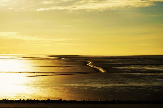 Wadden Sea world heritage, beautiful sunset on the North Sea coast