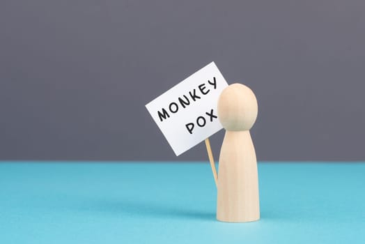 The word monkeypox is standing on a sign, outbreak of the MPXV virus pandemic, infectious disease spreading