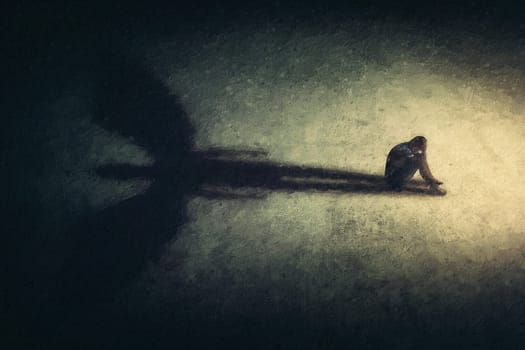 Surreal painting of a man sitting alone isolated in a dark room, casting a shadow of a powerful guardian angel. Inner strength metaphor. Introvert person found an imaginary friend
