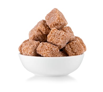 The Raw of brown sugar cubes isolated on white background