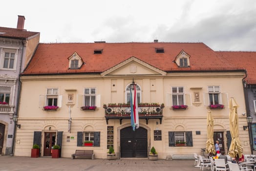 SAMOBOR, CROATIA-May 22, 2022: The City center of Samobor, with its church in the background, is a tourist attraction because of a ruined castle on a nearby hill.
