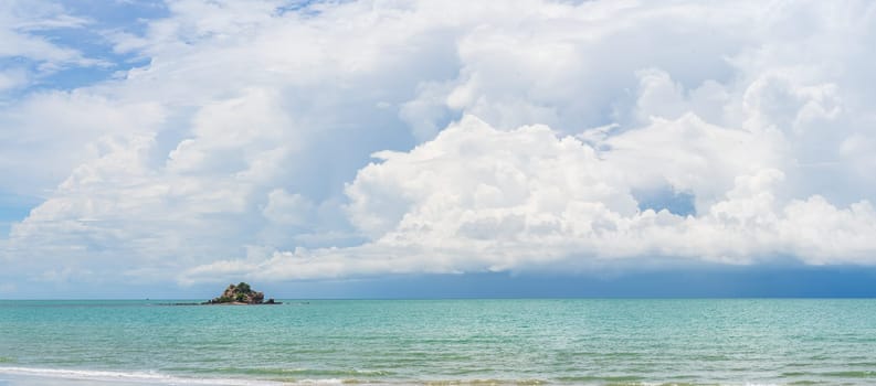 Panoramic nature landscape view of beautiful tropical beach and sea in sunny day with small island