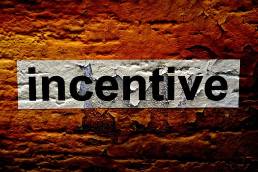 Incentive text on grunge background