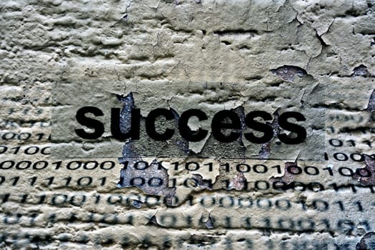 Success text on grunge background
