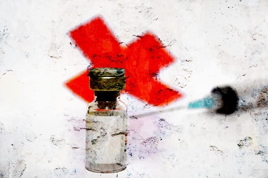Syringe and red cross