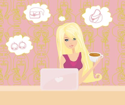 Online shopping - young woman sitting with laptop computer