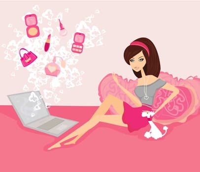 Online shopping - young smiling woman and her puppy sitting with laptop computer