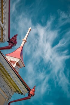 Wooden historical building in Tomsk on the sky background editorial