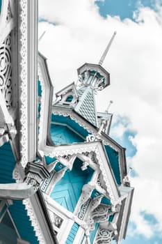 Wooden historical building in Tomsk on the sky background editorial