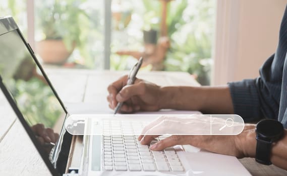 Business man searching and working with computer laptop on table at home. Working online business concept.