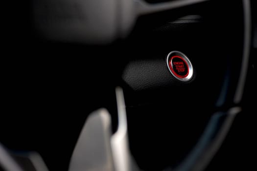Start button in car engine red push