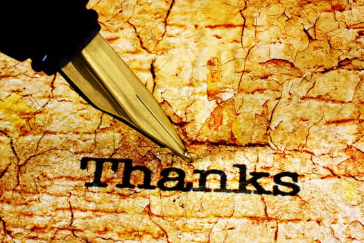 Fountain pen on thank you text