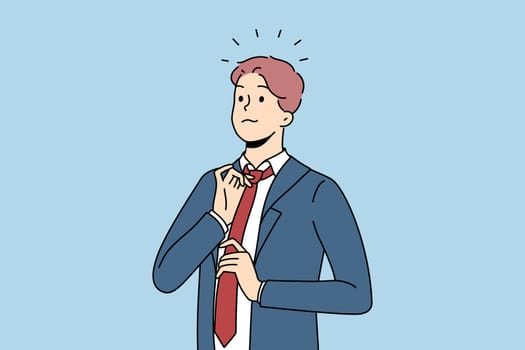 Self-confident businessman in suit and tie