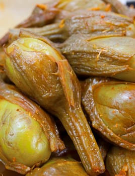 Almagro pickled eggplants. Delicious pickled snack displayed plastic basket