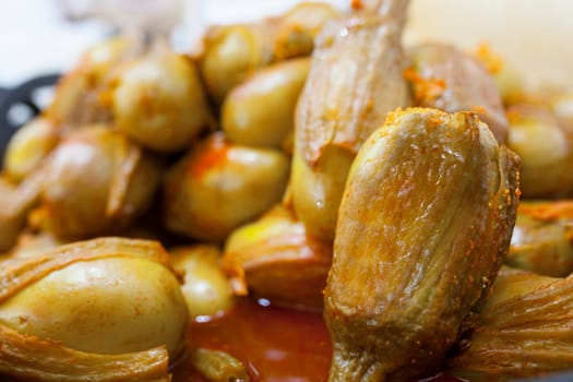 Almagro pickled eggplants. Delicious pickled snack displayed plastic basket