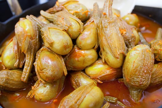 Almagro pickled eggplants. Delicious pickled snack displayed plastic basket