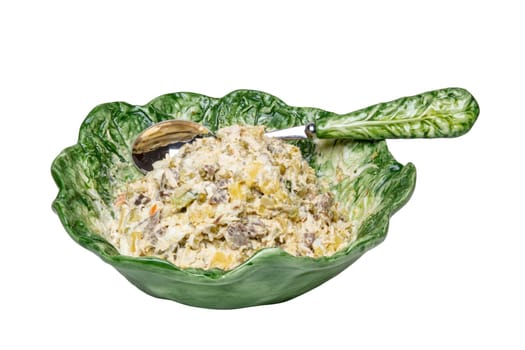 Salad bowl top view. Fresh salad in a decorative green bowl with matching spoon isolated on a white background. Clipping path. Healthy food. Macro.
