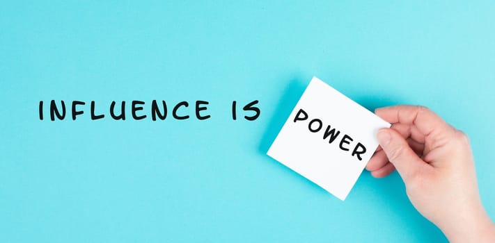 Influence is power is standing on the paper, business branding, social media, coaching and leadership concept, marketing strategy, network for success