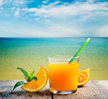 Summer orange cocktail on the beach