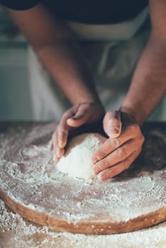 Man baking bread in the kitchen. Retro style.