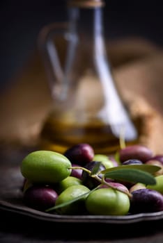 Still life with olives and olive oil