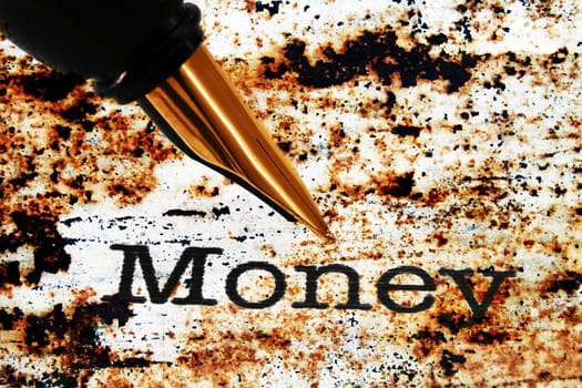 Fountain pen on money text