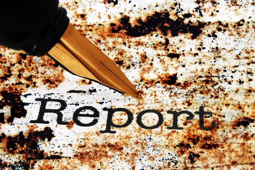 Fountain pen on report