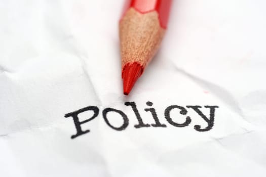 Pencil on policy text
