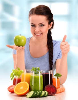 Young woman with variety of vegetable and fruit juices. Detox diet.