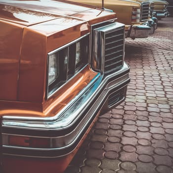 Old retro or vintage car or automobile front side with front light or headlight. Processed by vintage or retro effect filter