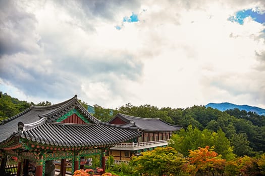 Traditional asian buddhist monks temple in mountains in South Korea at autumn