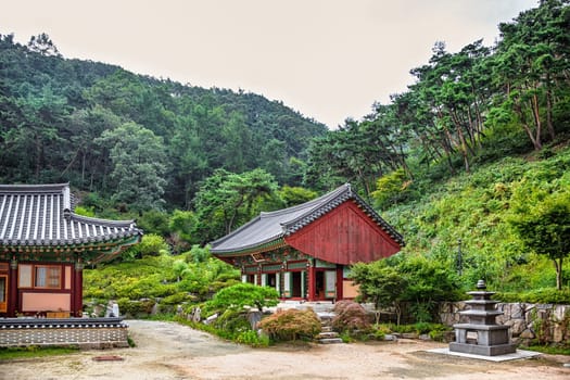 Traditional asian buddhist monks temple in mountains in South Korea at autumn