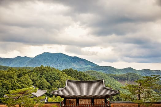 Traditional asian buddhist monks temple in mountains in South Korea at autumn