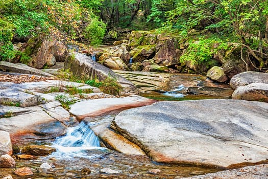 River with rocks and stones in mountain forest in South Korea