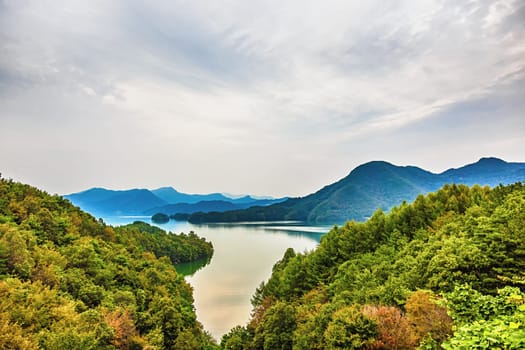 Mountains with green trees and lake landscape in South Korea